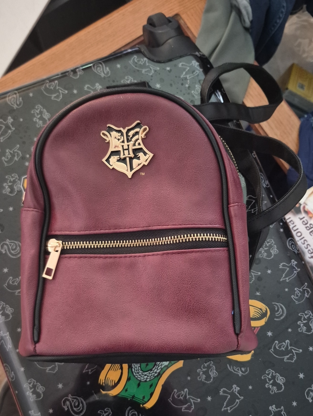 Warner Bros. Maroon Mini Backpack with Gold Crest